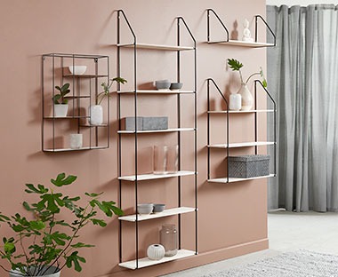 A series of wall shelves with metal wire frame and wooden shelves