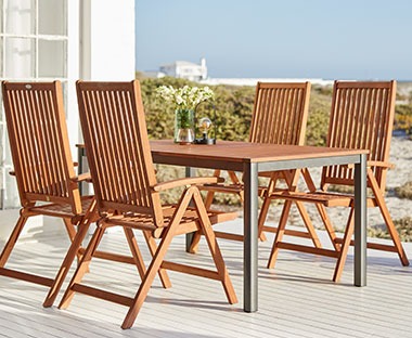 Folding wooden chairs with high backs
