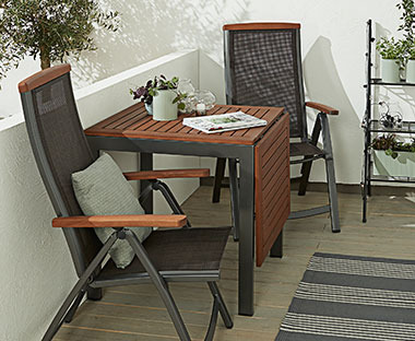 Folding wooden garden table ideal for small balconies and patios