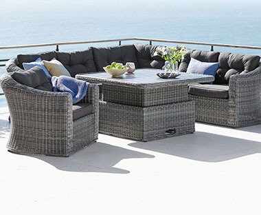 Quality polyrattan garden lounge set in grey with plush garden cushions. Corner garden sofa