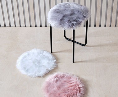 Faux fur seat cushions in white pink and grey colours