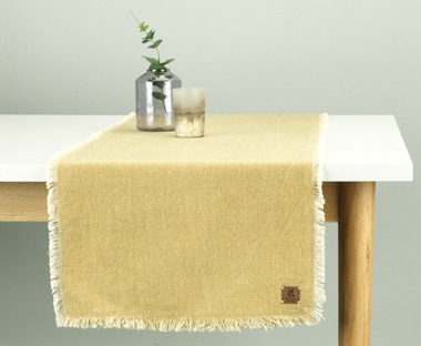 A table runner can easily decorate a table