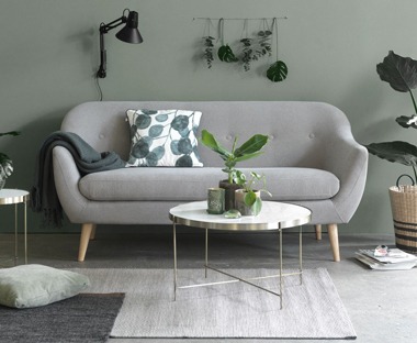 grey sofa with light wooden feet