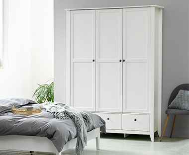 White three door wardrobe with three drawers