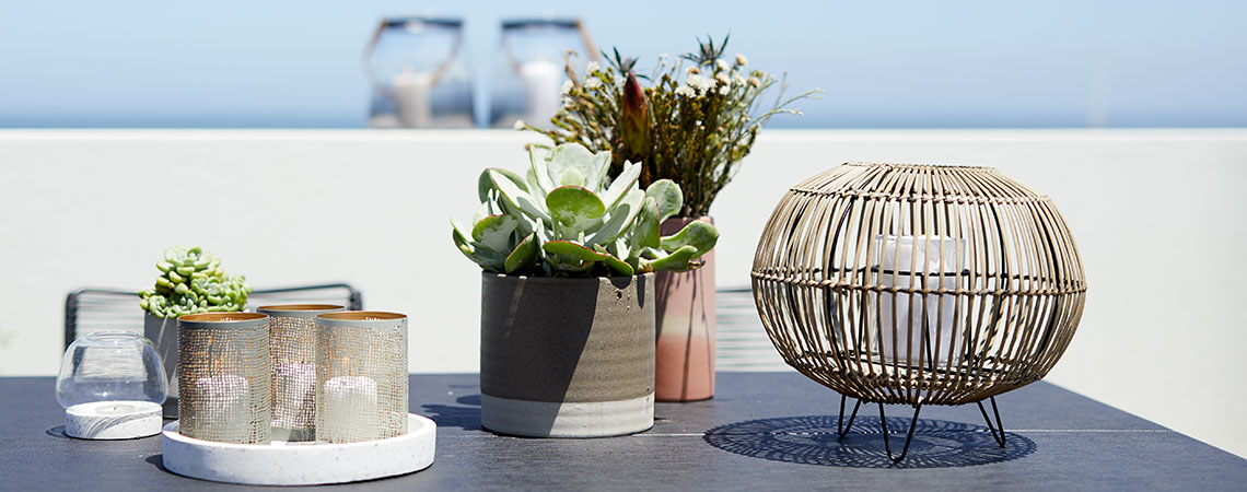 Woven lanterns and balcony planters for your patio | JYSK 