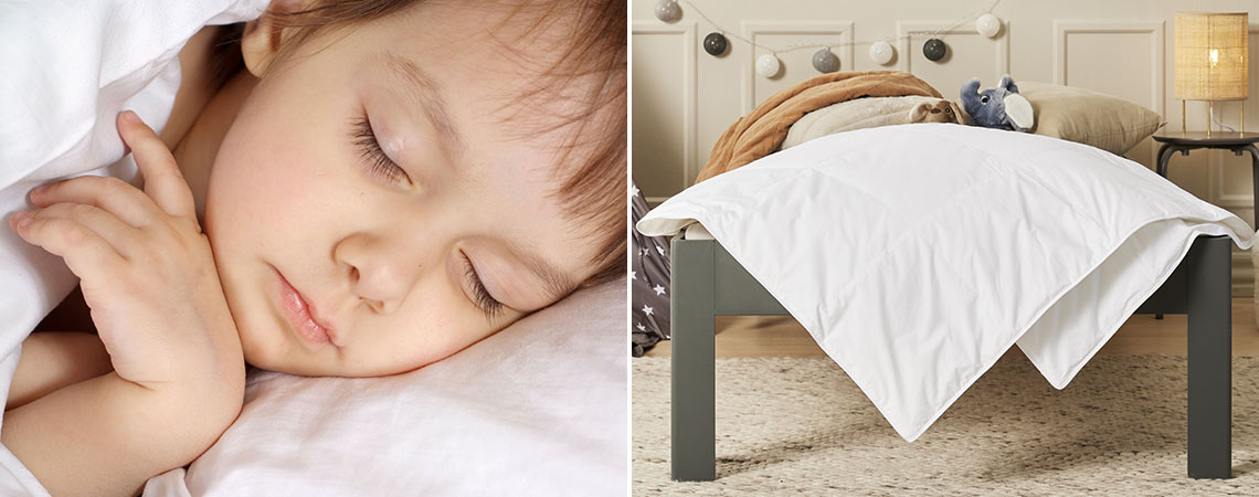 Child asleep and children’s room with bed with children’s duvet 
