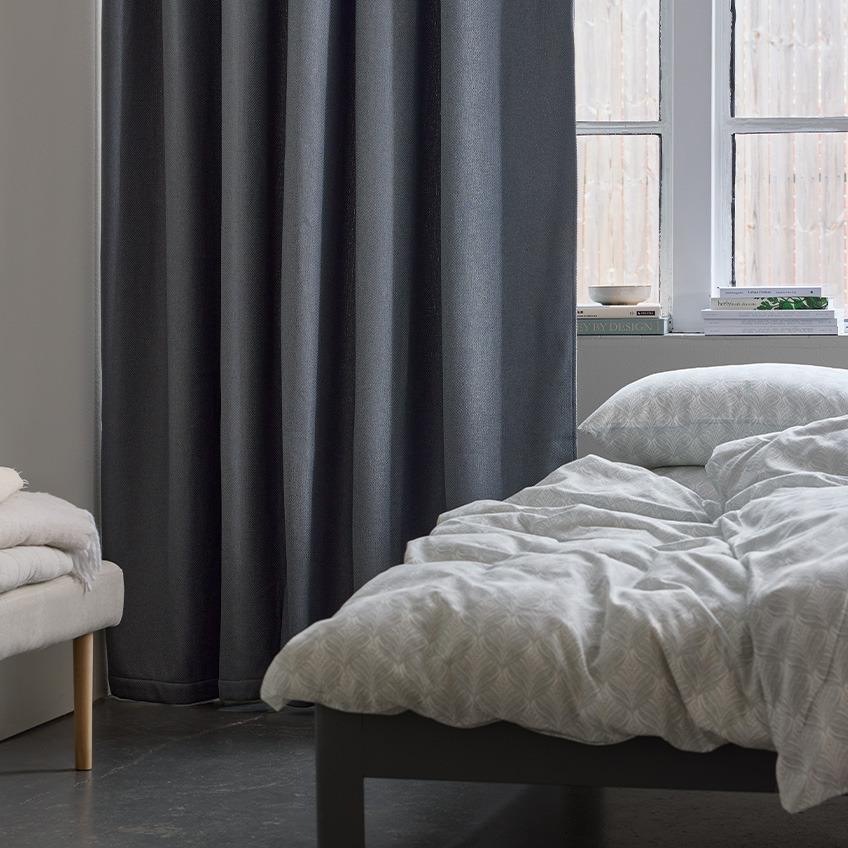 HERDLA insulating curtain in grey in bedroom 