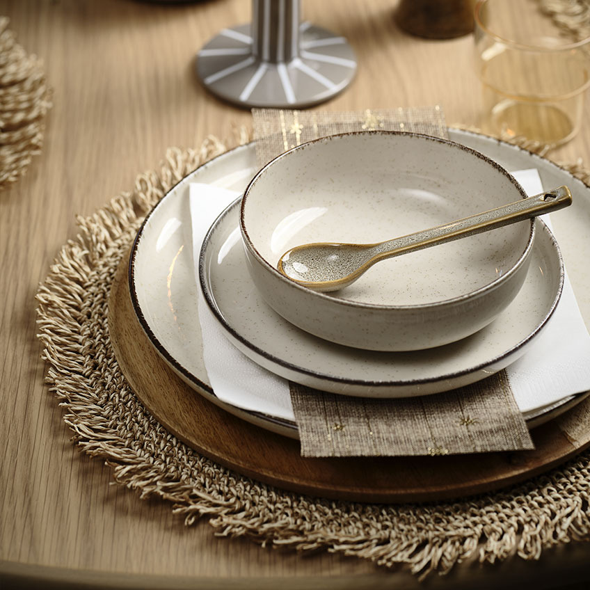 Birthday table set up with wooden decorative tray, dinner plate, lunch plate, bowl and stoneware teaspoon 