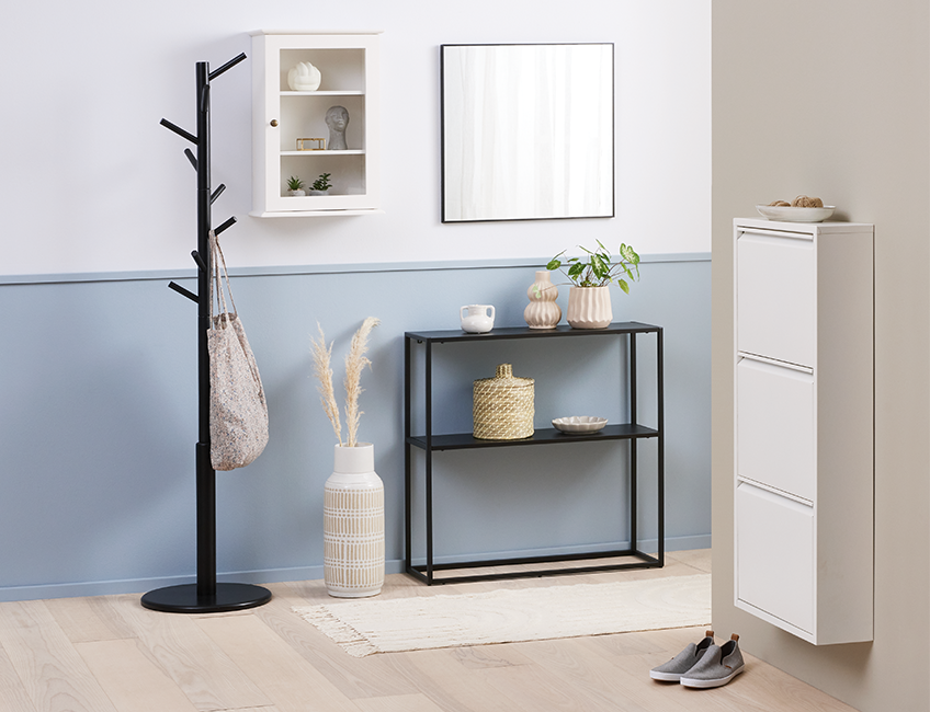 Hallway with a clean and simple shoe cabinet in white