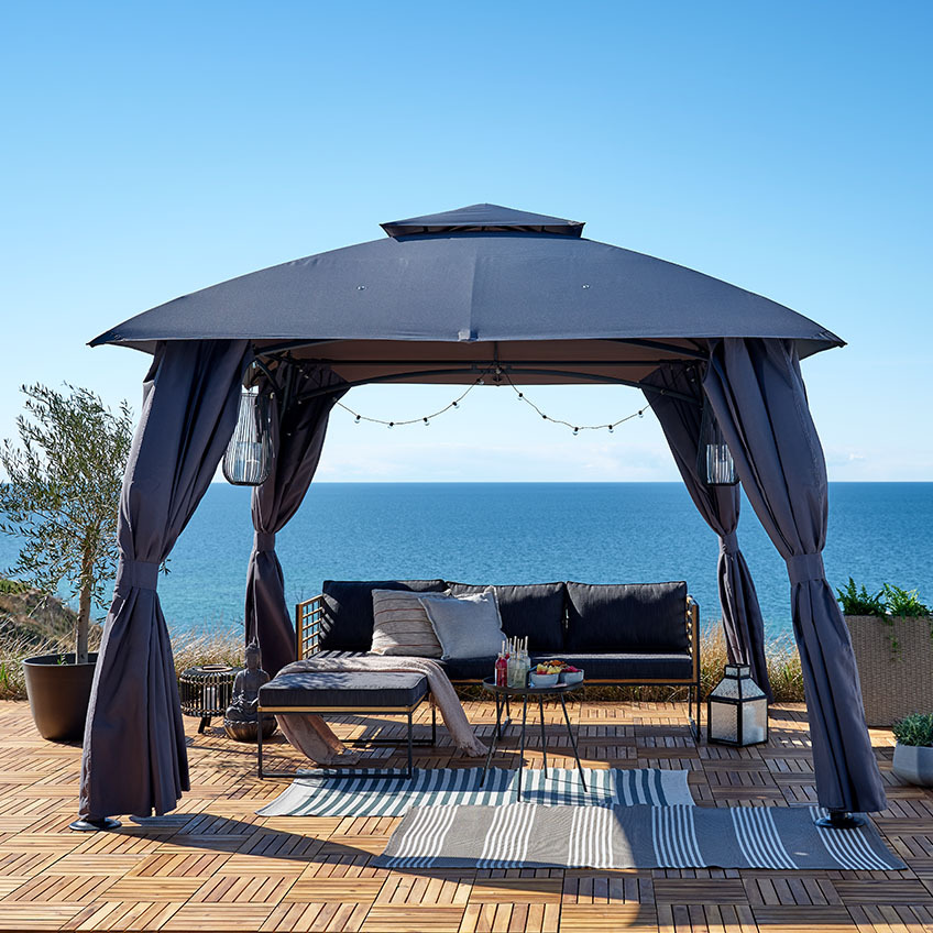 Large grey gazebo with insect nets in its side panels that are adjustable 