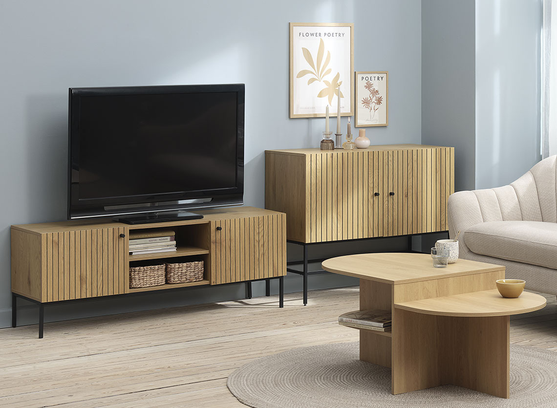 TV bench with a TV in a living room with sofa, coffee table and sideboard