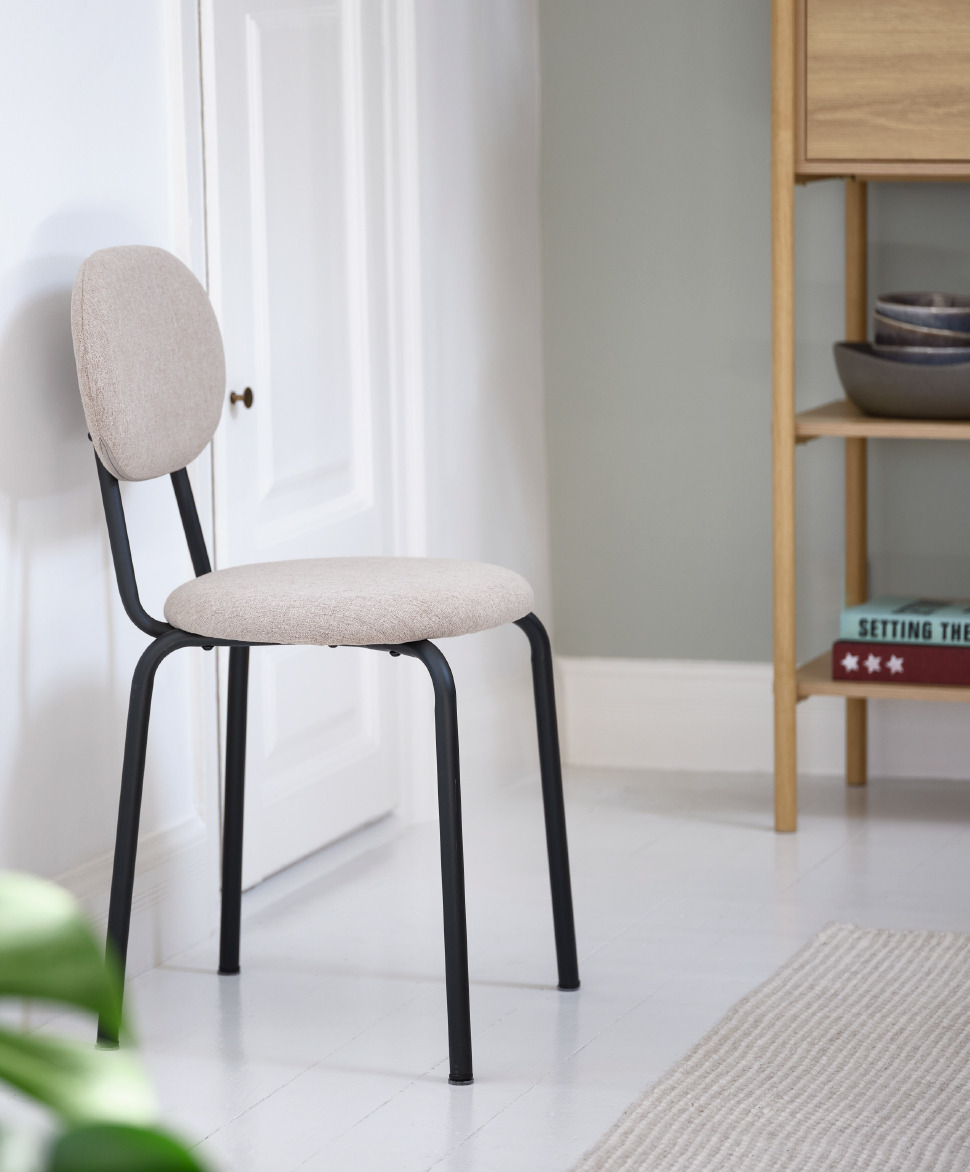 cream dining chair with black legs