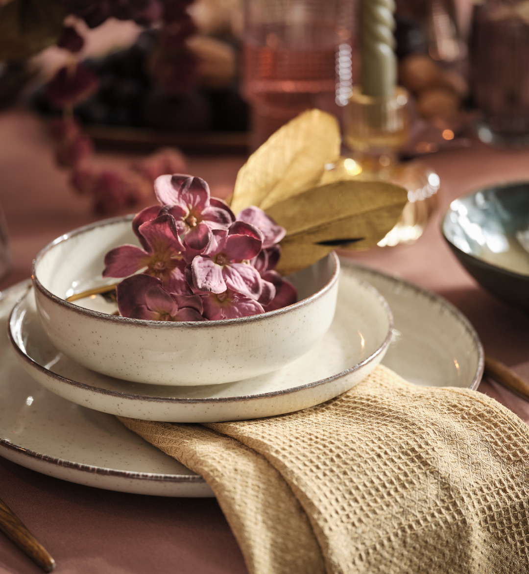 : A table set with bowls and plates