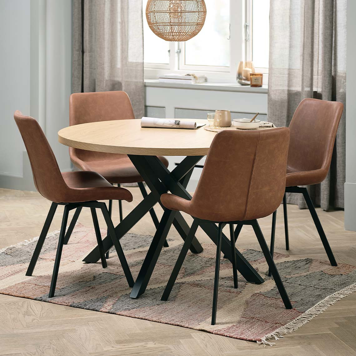 Swivel dining chairs in cognac faux leather 