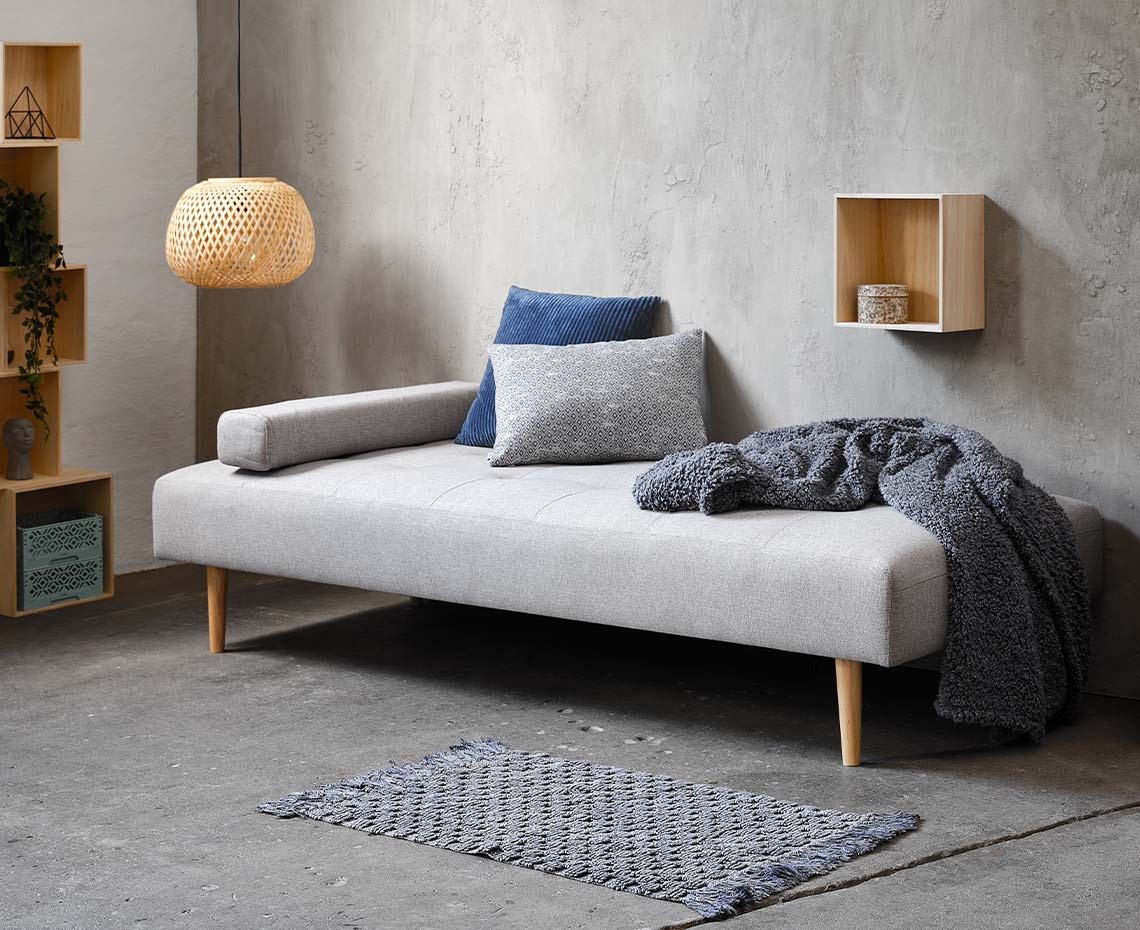 Light grey modern daybed with cushions