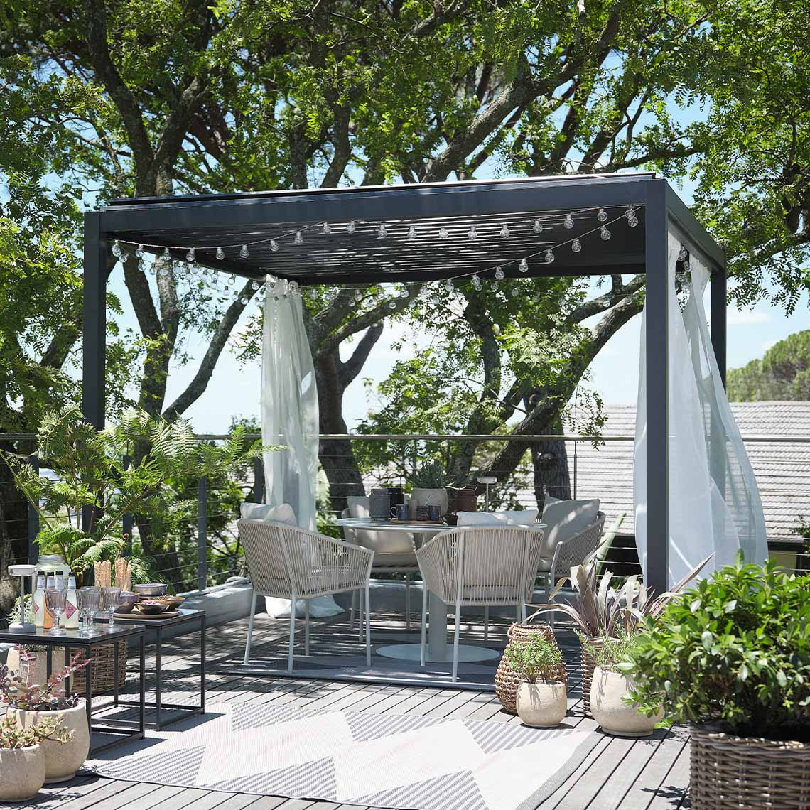 Garden pergola with roof slats