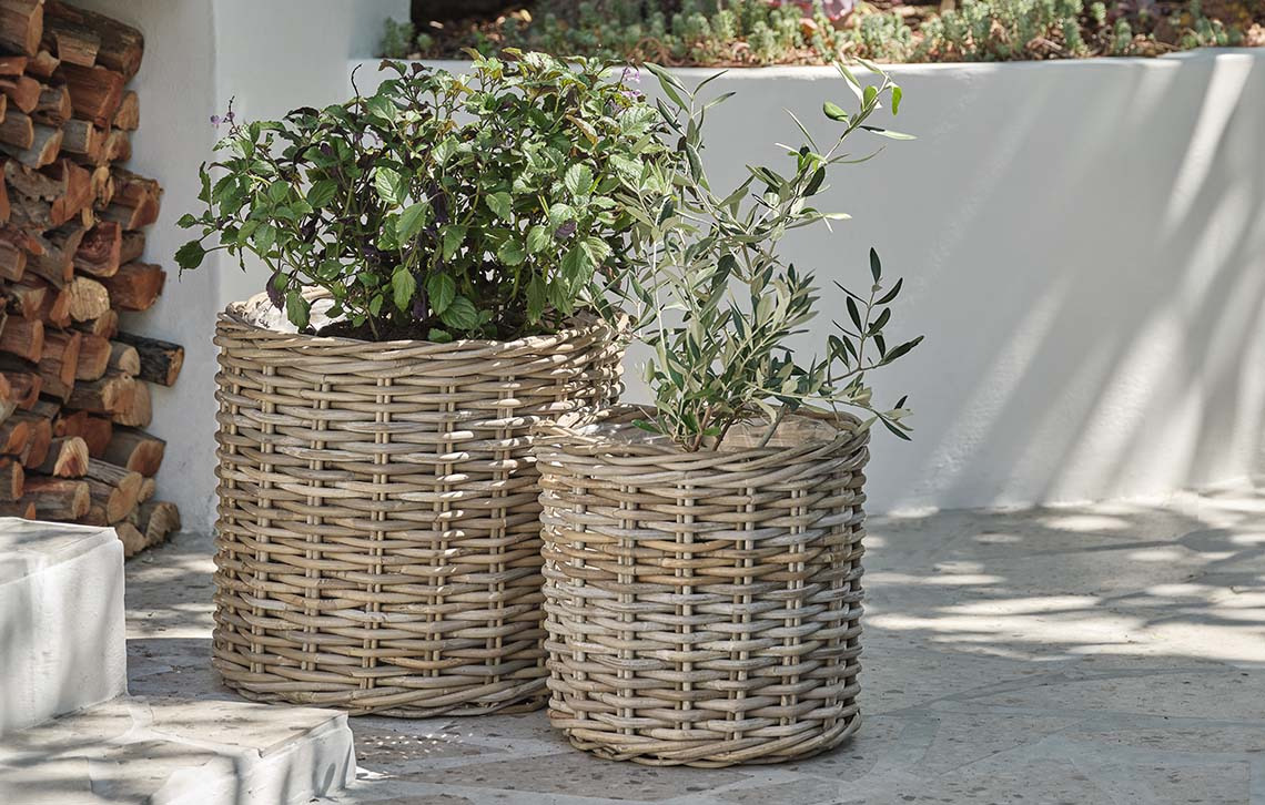 Rattan wicker garden planters in a variety of shapes and sizes