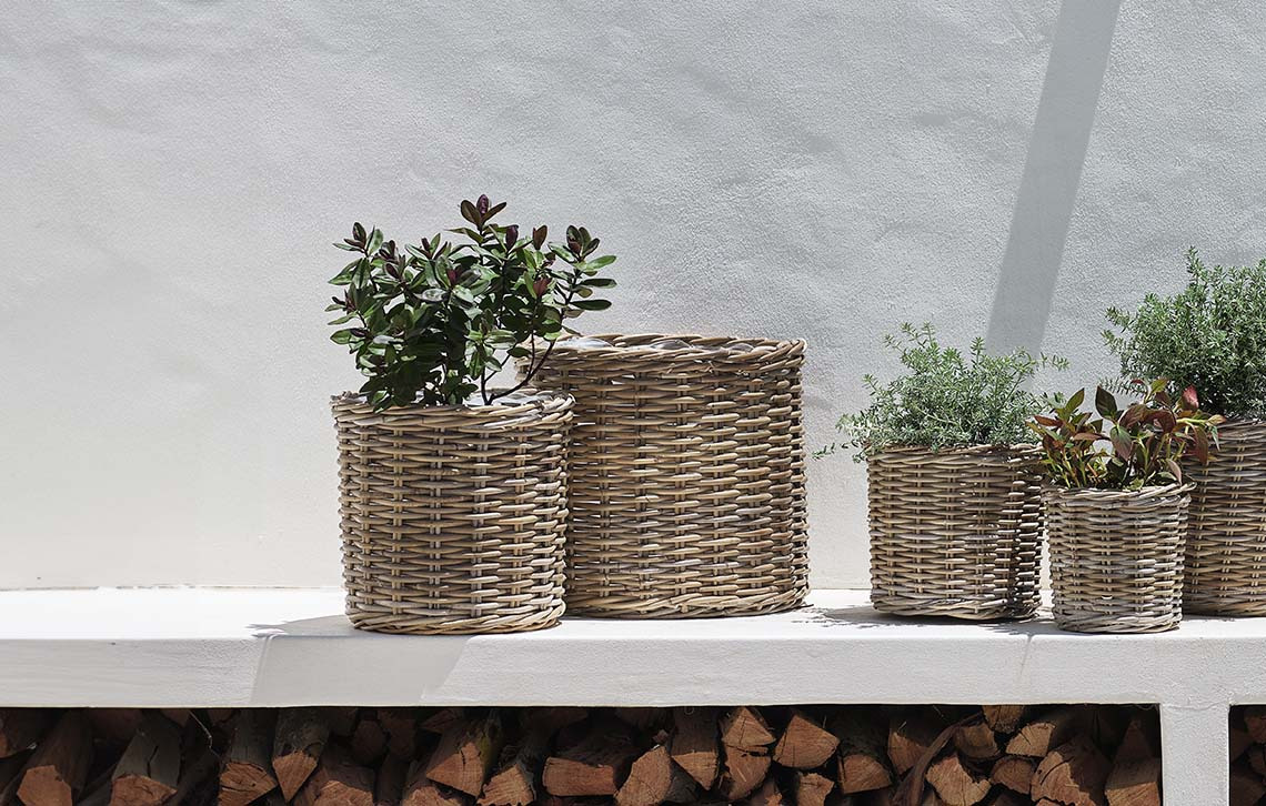 Rattan wicker garden planters in a variety of shapes and sizes