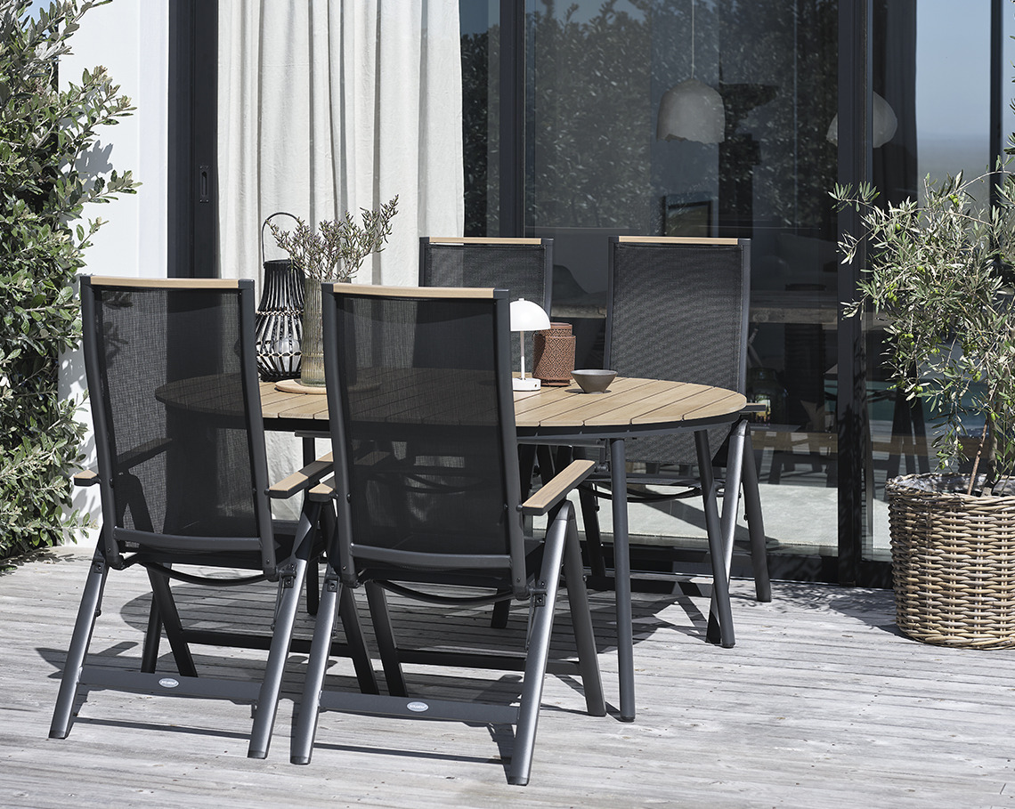 TAGEHOLM garden table with BREDSTEN garden chairs Oval garden table with garden chairs on a patio