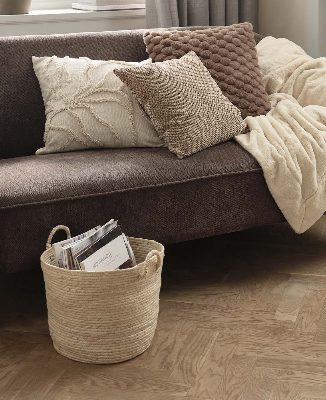 The JUSTIN basket is made with maize leaves A crafted woven basket made with maize leaves in a natural beige colour