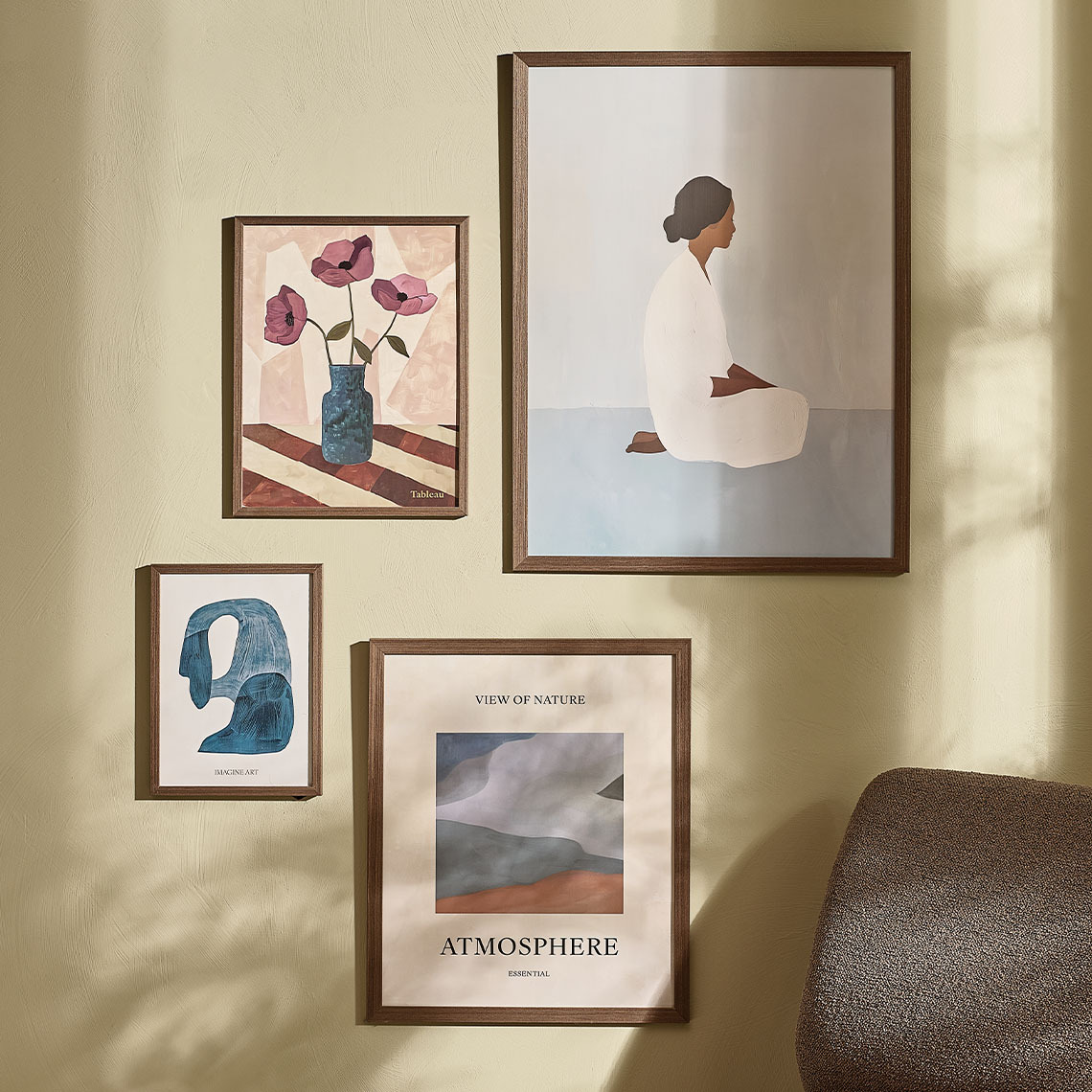 TORD frames in dark wood in different sizes Photo frames made with dark wood in different sizing hanging on wall