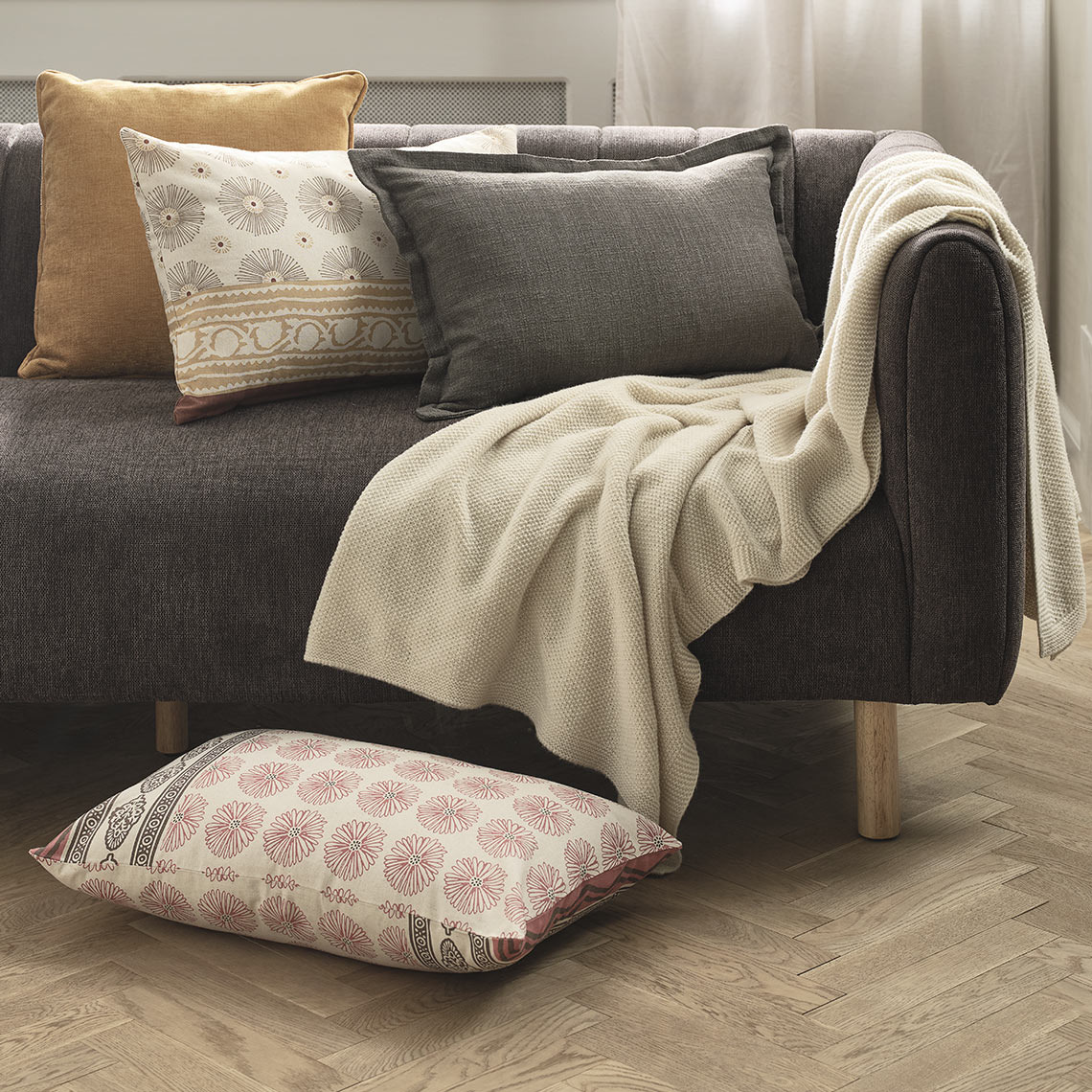 KATTEFOT patterned cushions and HUMLE throw  Cushions and throw in sofa