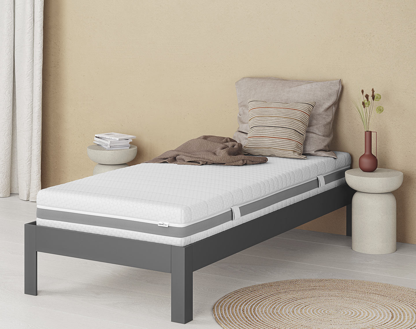 Grey, metal bed frame in a bedroom 