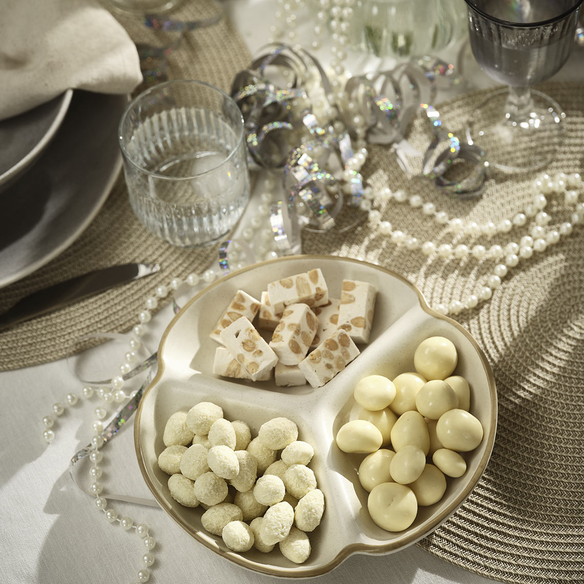 White compartment tray with snacks  