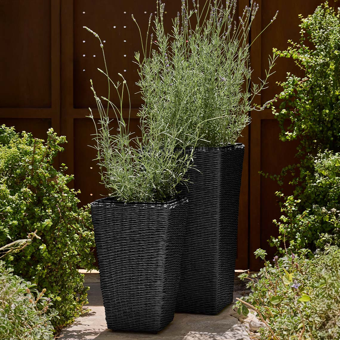 Large garden planters in black polyrattan 