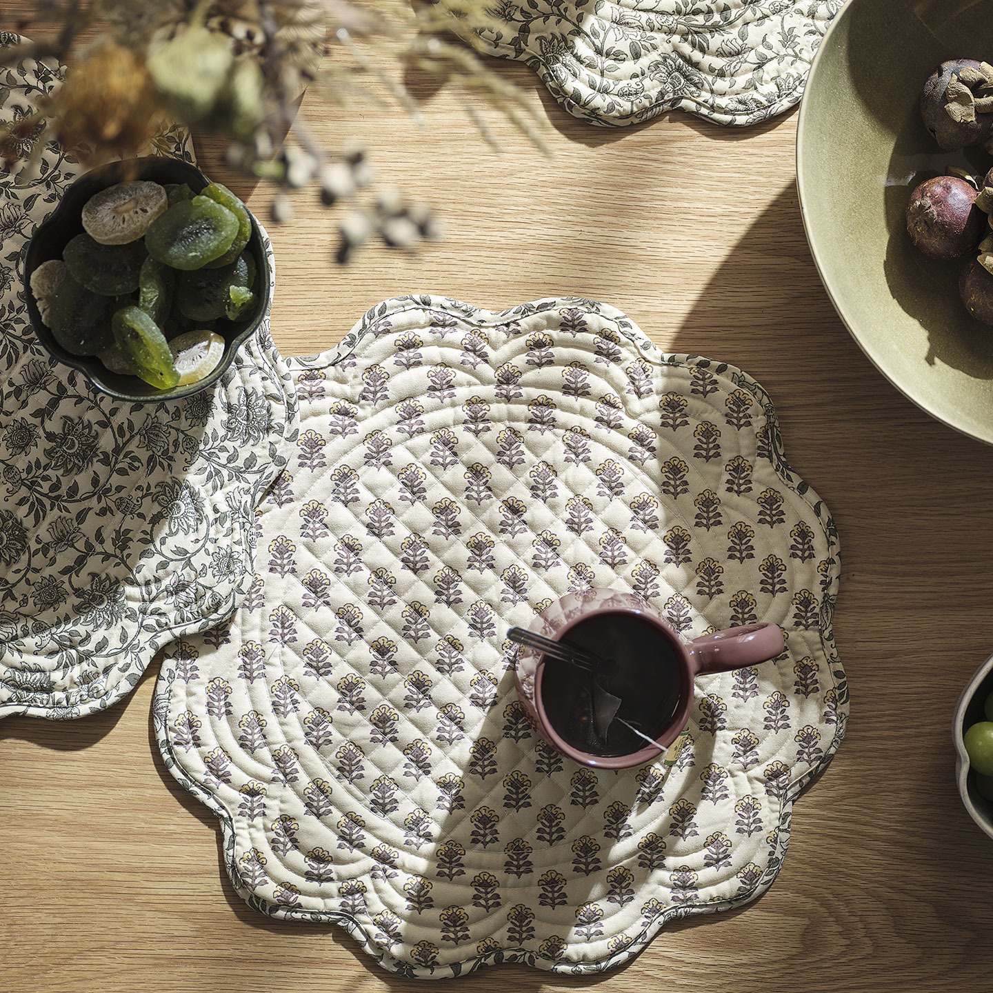 Dining table with bowls, mug and placemats