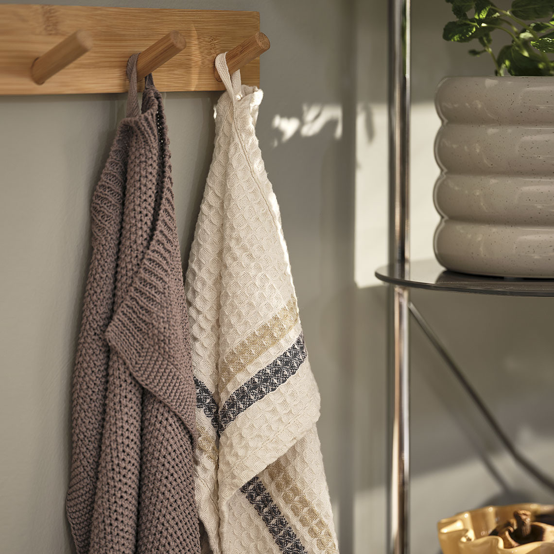 Tea towels on kitchen hooks