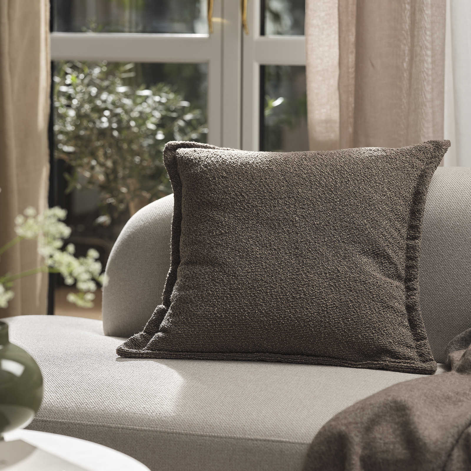 GULDBLOMME cushion cover in brown bouclé Sofa with brown sofa cushion cover