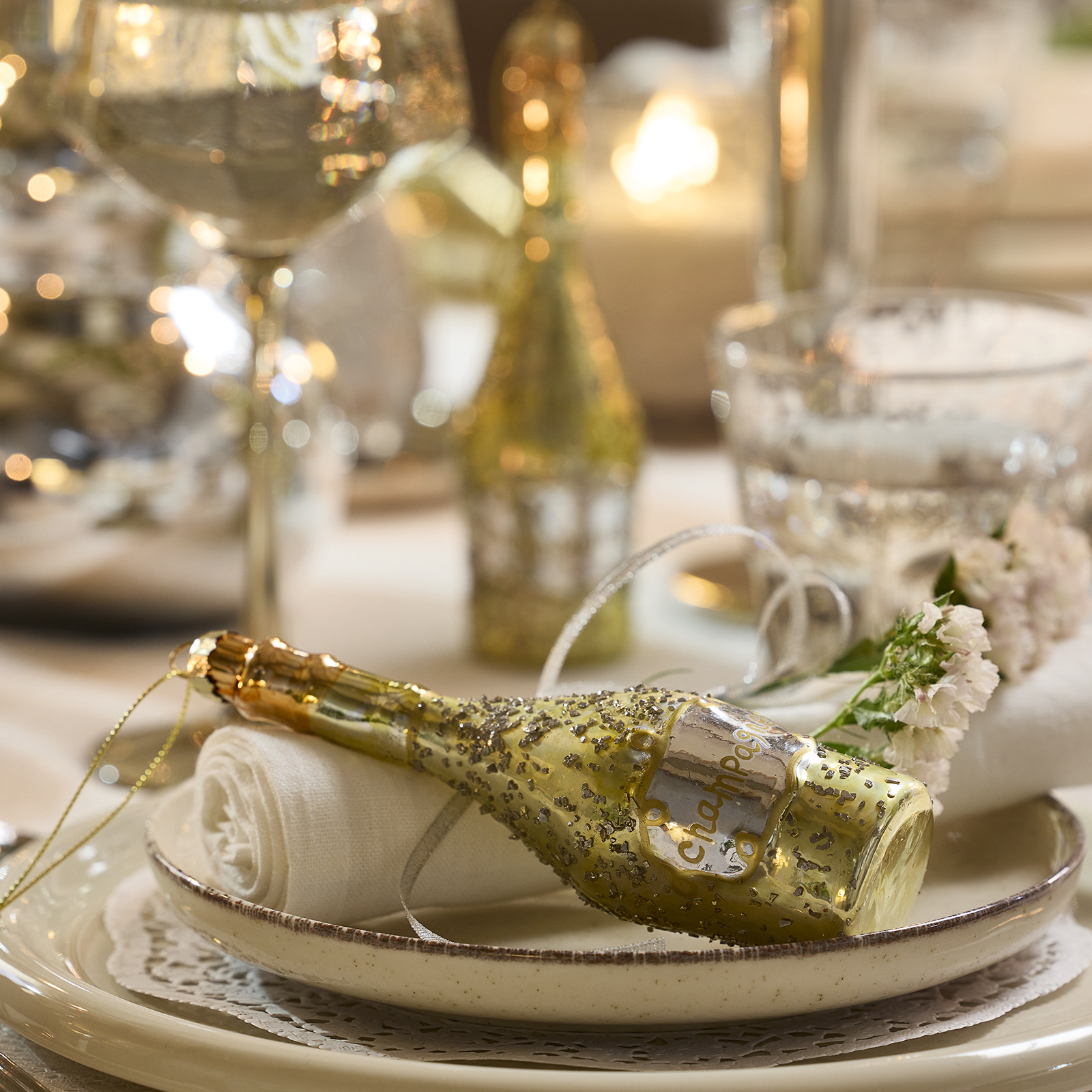 ALSVIN Christmas tree decoration Place setting adorned with champagne bottle shaped Christmas tree decoration
