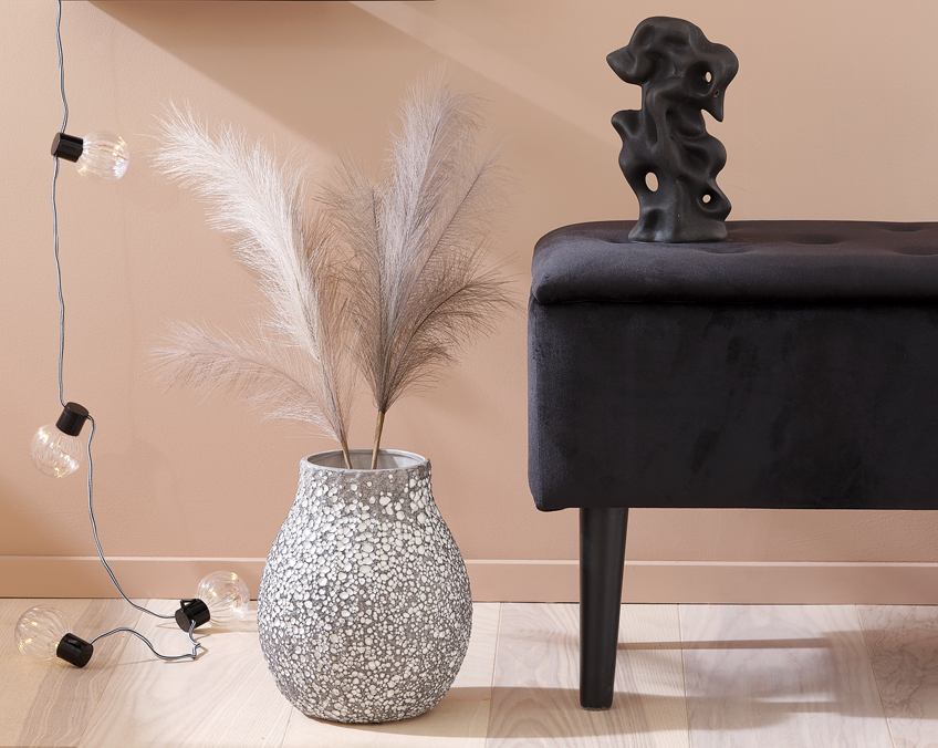 KRISTOFFER artificial flower standing in MATHIAS vase Faux flowers presented in vase next to different living room décor