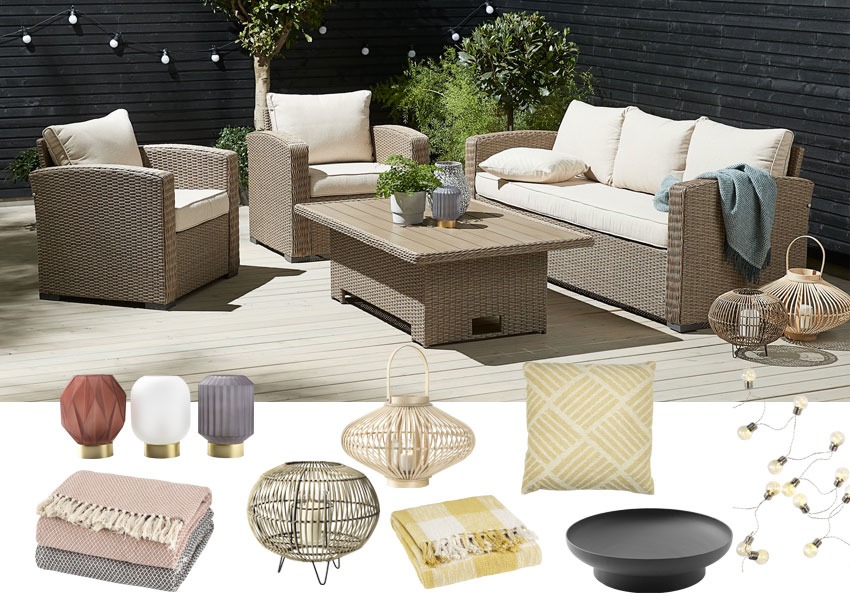 VEMB lounge set in natural rattan in a decked garden 