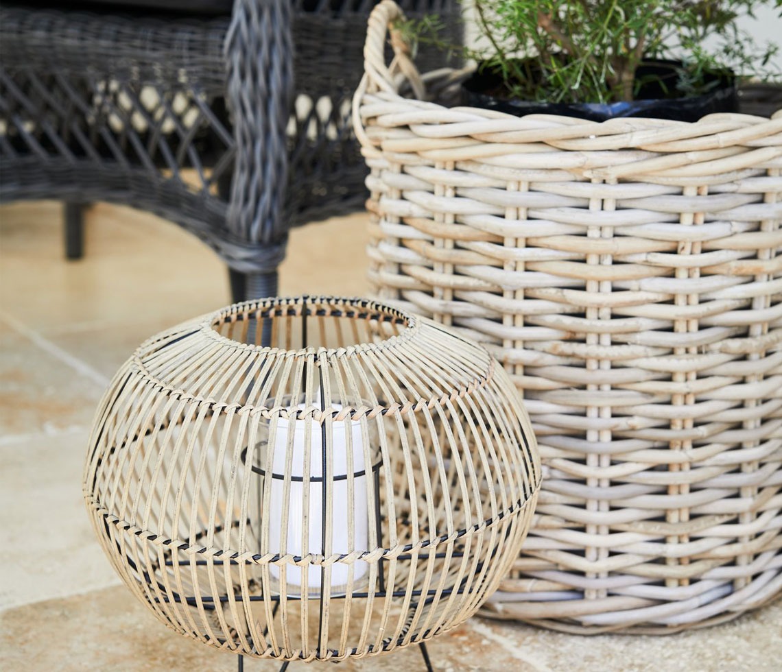 woven wooden planter and small wooden lantern