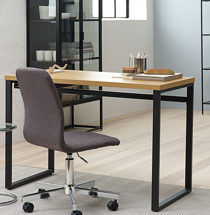 Desk with black metal legs and grey office chair