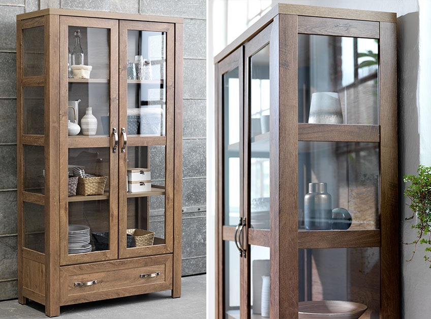 Tall wooden cabinet with glass doors and sides and one drawer