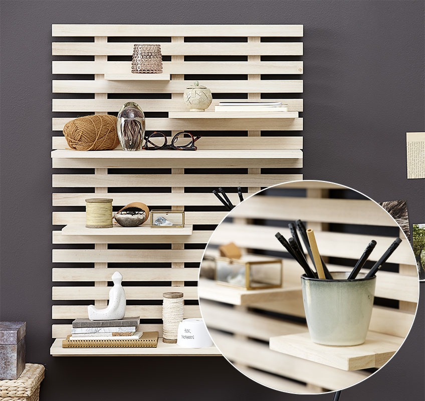 KETTINGE wall shelf with 6 smaller shelves in different sizes Wall mounted shelf with stationery, notebooks, and candleholders