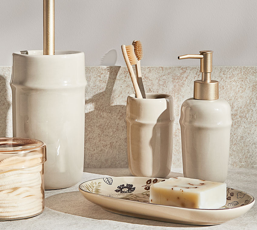 GRUMS storage jar and BOLIDEN bathroom set with toothbrush holder, soap dispenser and toilet brush Glass storage jar and bathroom set in beige ceramic