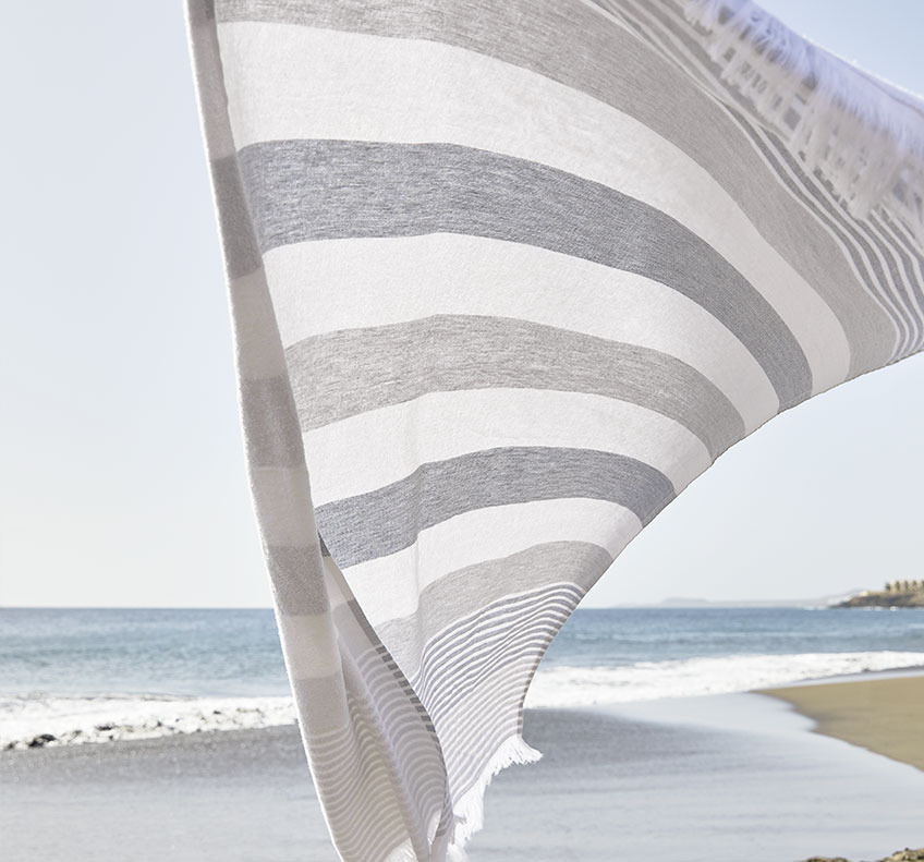 Striped towel blowing in the wind  