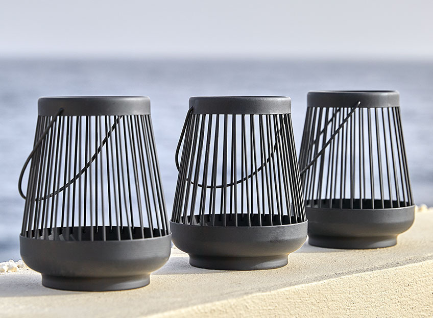 SKOGDUE lanterns are available in black, green and white Black lanterns in metal