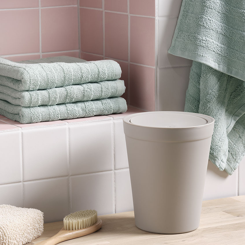 Hand towels and toilet bin in a bathroom 